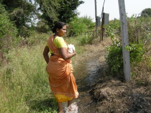 Farmer suicide widow walking on rural path